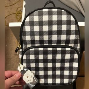 Grey and black checker back pack